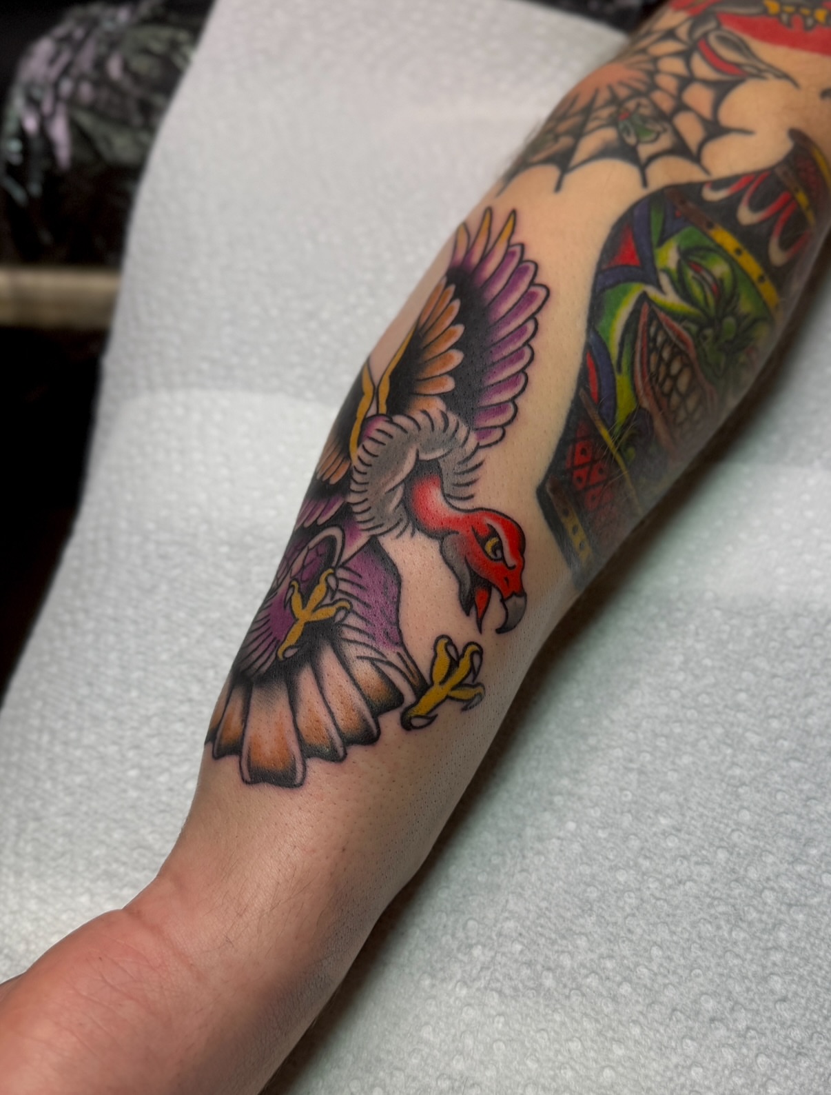 Bird American traditional tattoo on the forearm by Ethan, Toledo, Ohio