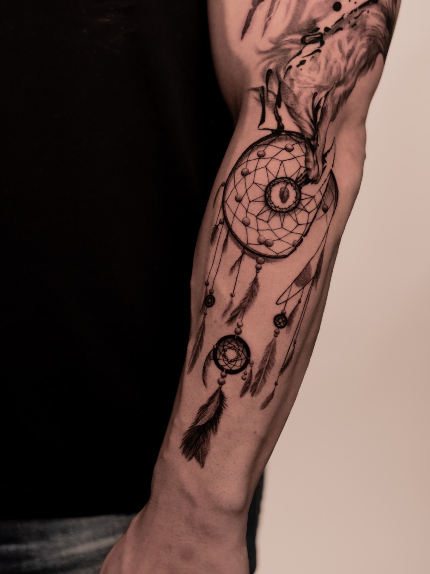 Dreamcatcher black and grey tattoo on the forearm by Mark D, Los Angeles, California