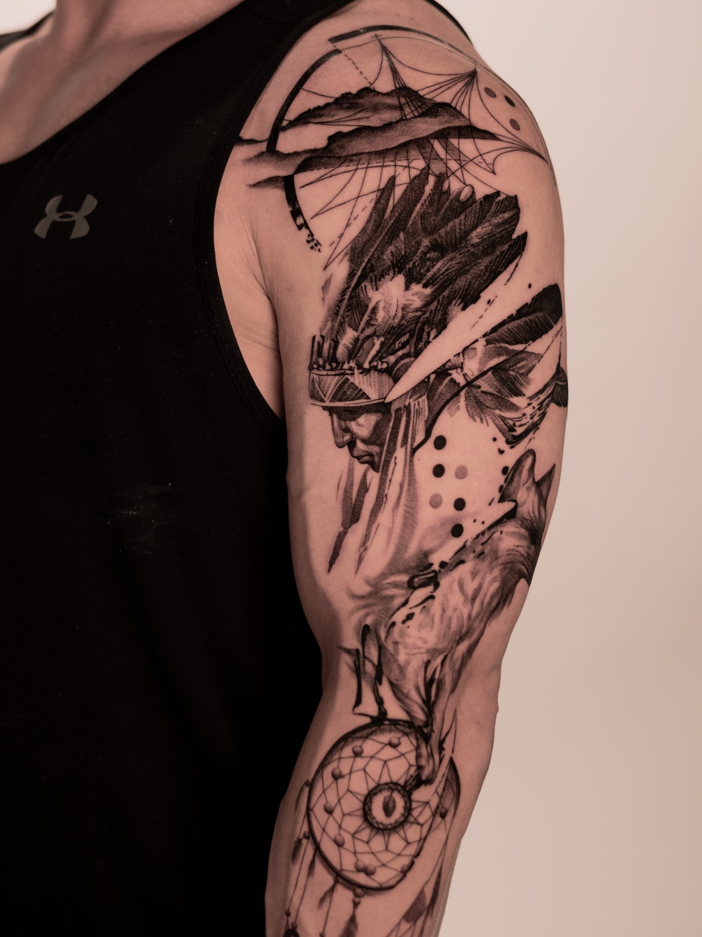 Indian chief realism tattoo on the upper arm by Mark D, Los Angeles, California