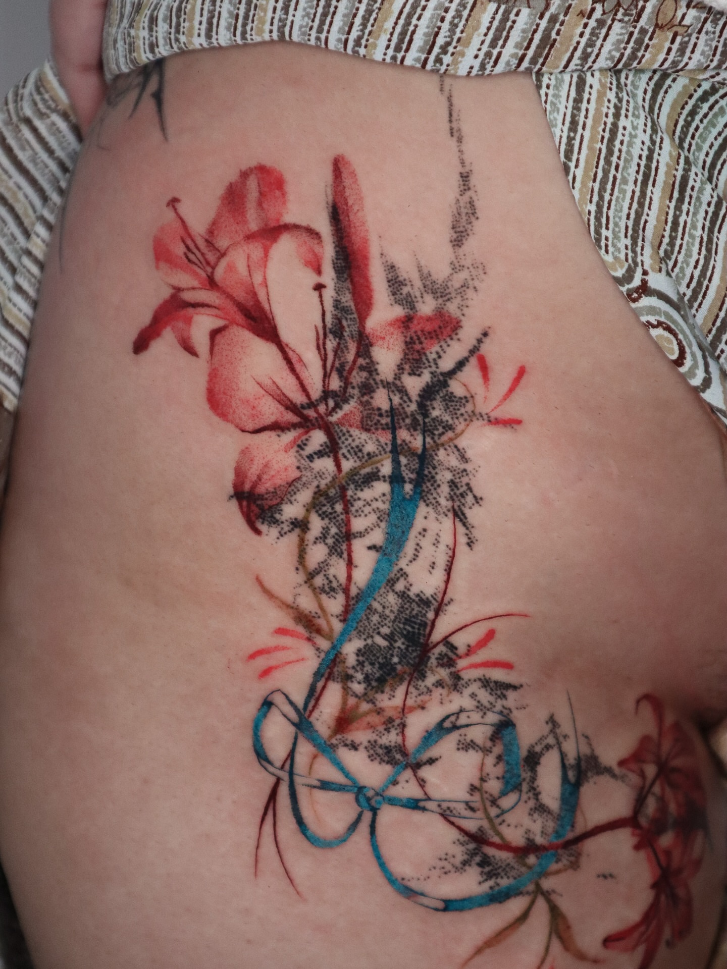 Lily and abstract design dotwork tattoo on the thigh by 𝕮𝖔𝖓𝖓𝖔𝖗 ☾  ~ TATTOO ARTIST