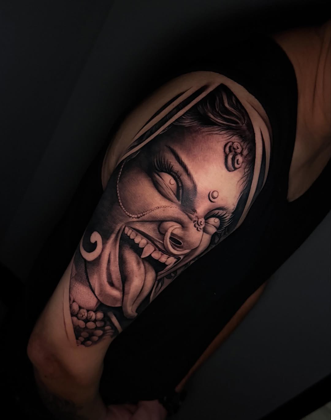 Demonic face with tongue out realism tattoo on the forearm by INK with KIRON 🇳🇵 🇺🇸DTX, Dallas, Texas