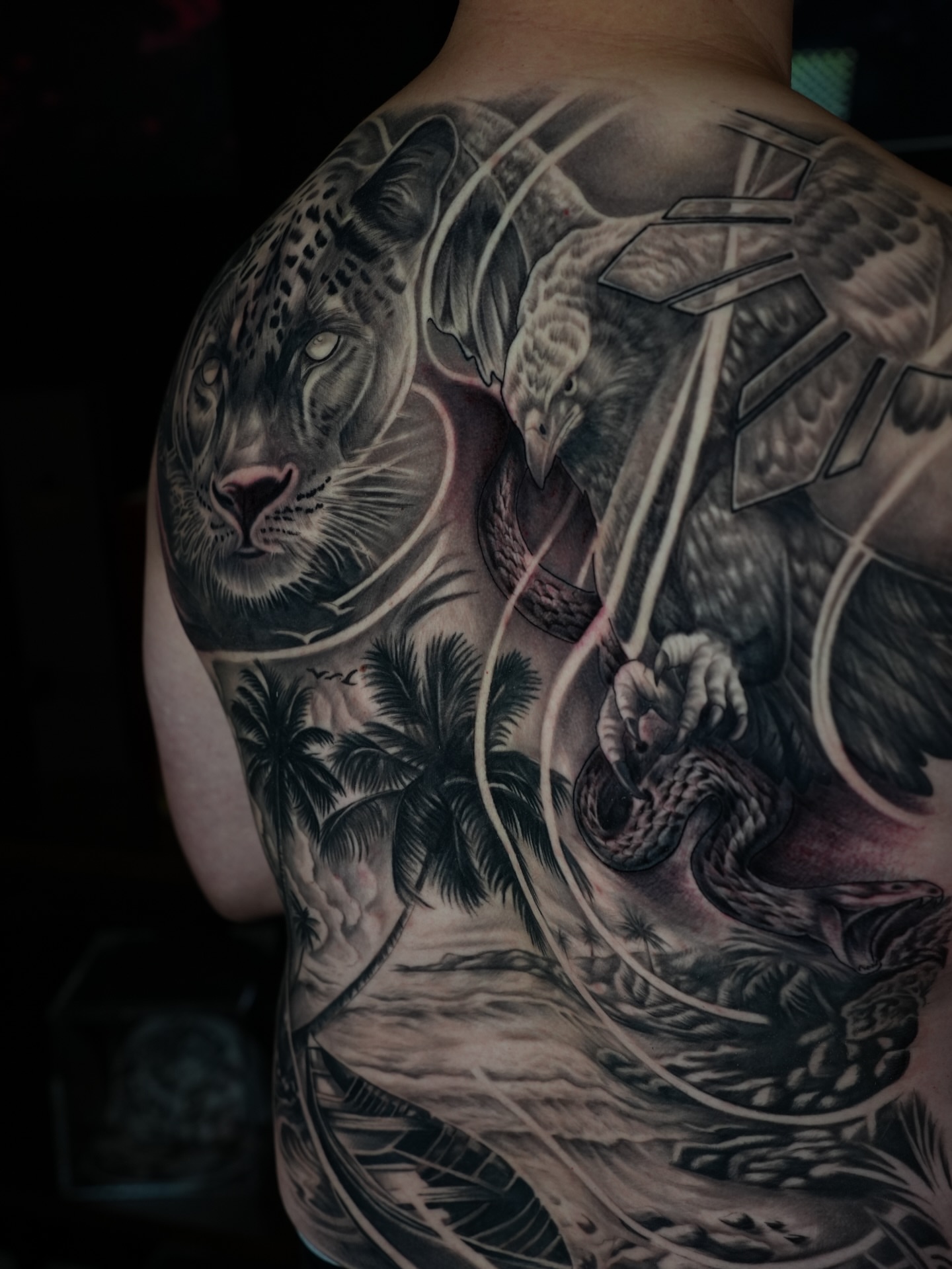 Jungle scene with leopard and eagle realism tattoo on the back by BillydaKid