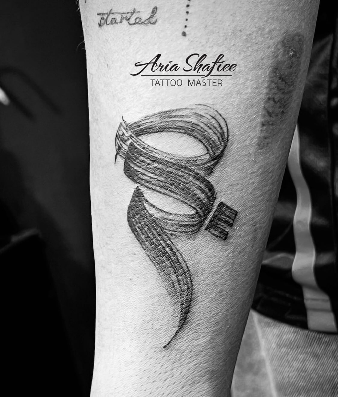 Tornado black and grey tattoo on the forearm by Aria Shafiee