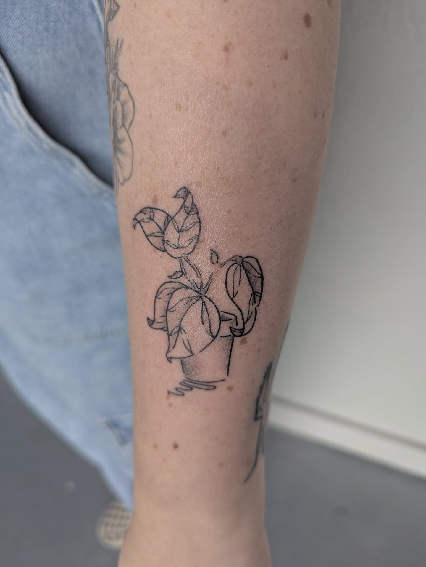 Plant geometric tattoo on the forearm by Patricio