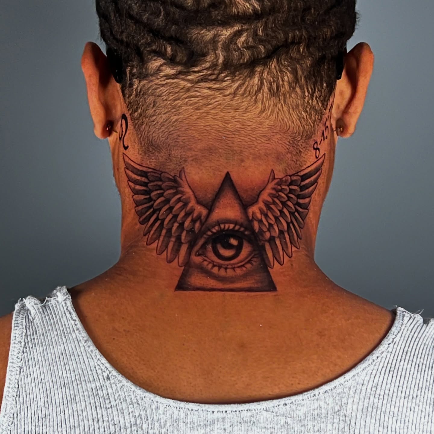 Eye with wings geometric tattoo on the neck by ☆ Kelly ☆