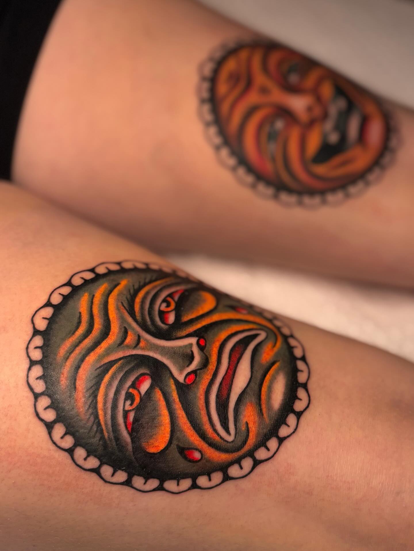 Mask American traditional tattoo on the thigh by Jesse Smith, Chicago, Illinois