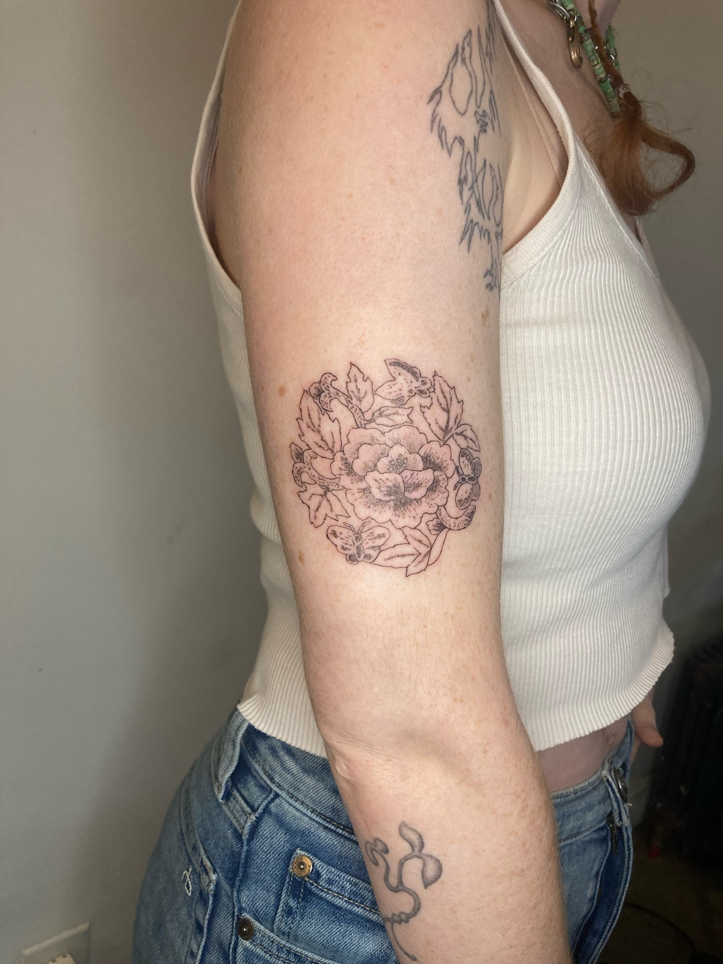 Peony bouquet black and grey tattoo on the forearm by 잡초