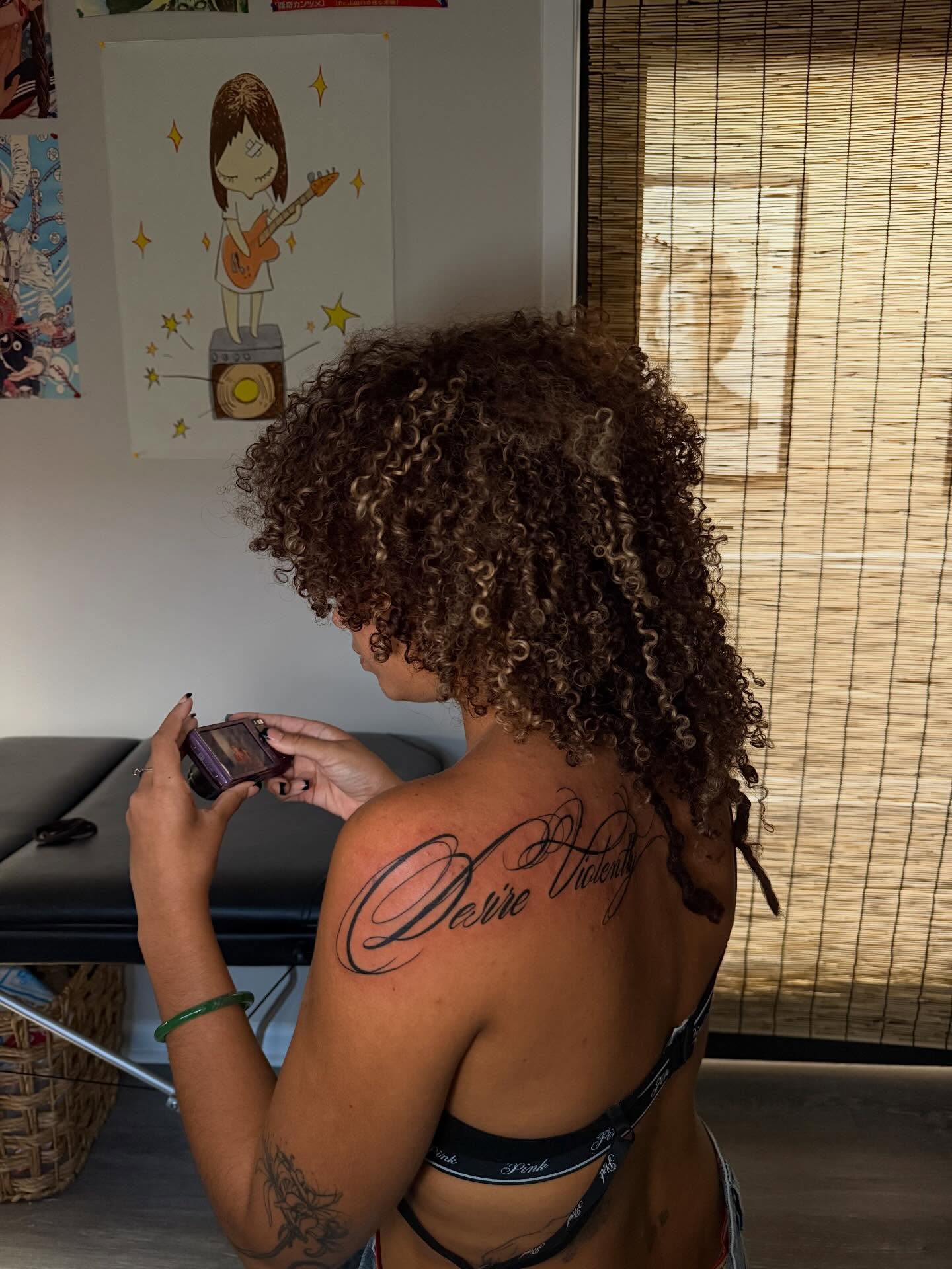 Script lettering lettering script tattoo on the back by sanjai