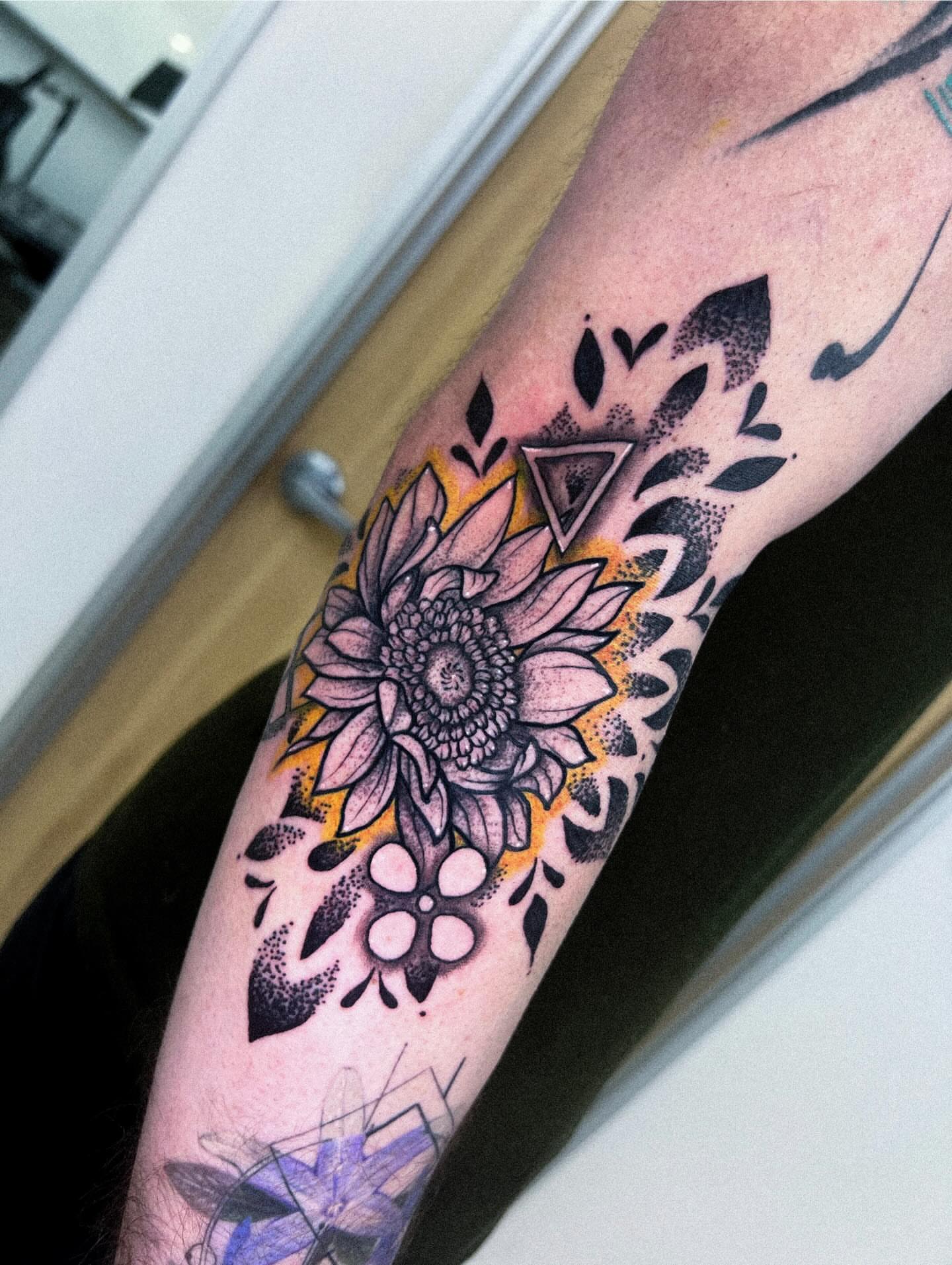Sunflower dotwork tattoo on the forearm by Ashley Fino, Las Vegas, Nevada