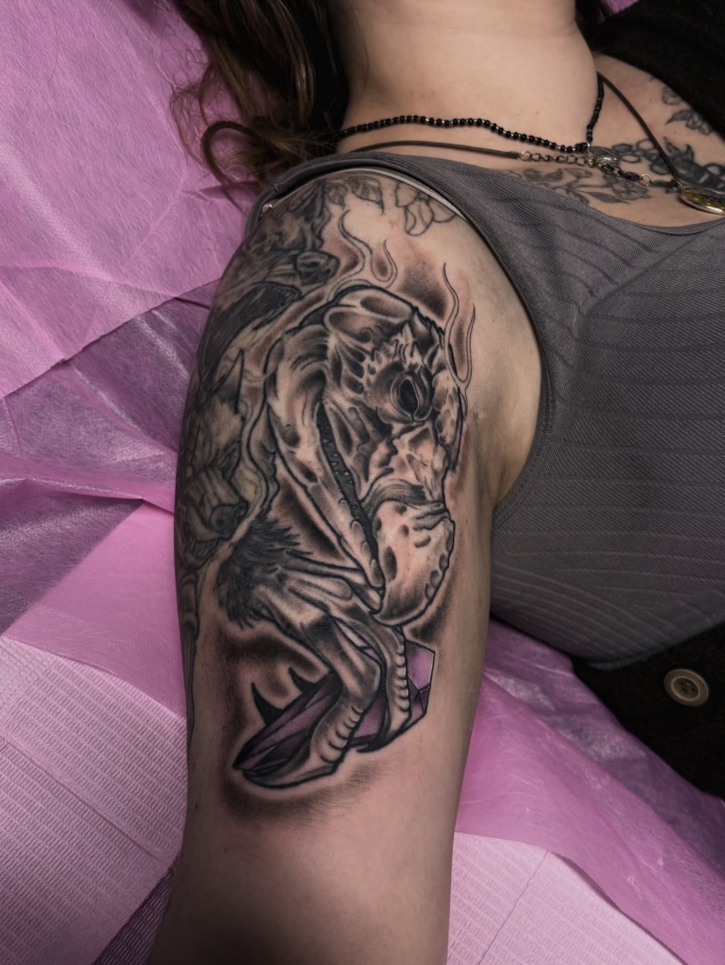 Abstract skull realism tattoo on the shoulder by Elixabeth