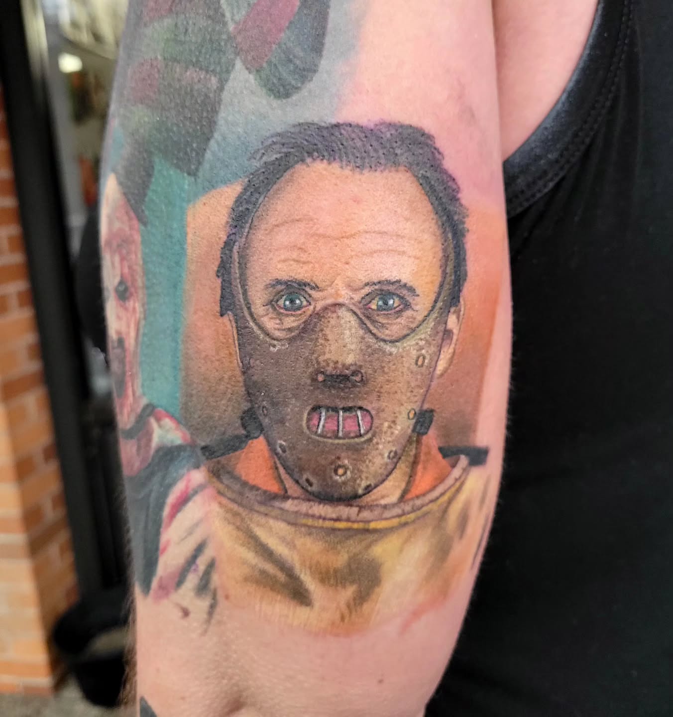 Horror movie character realism tattoo on the forearm by Jessica Czernics, Pittsburgh, Pennsylvania