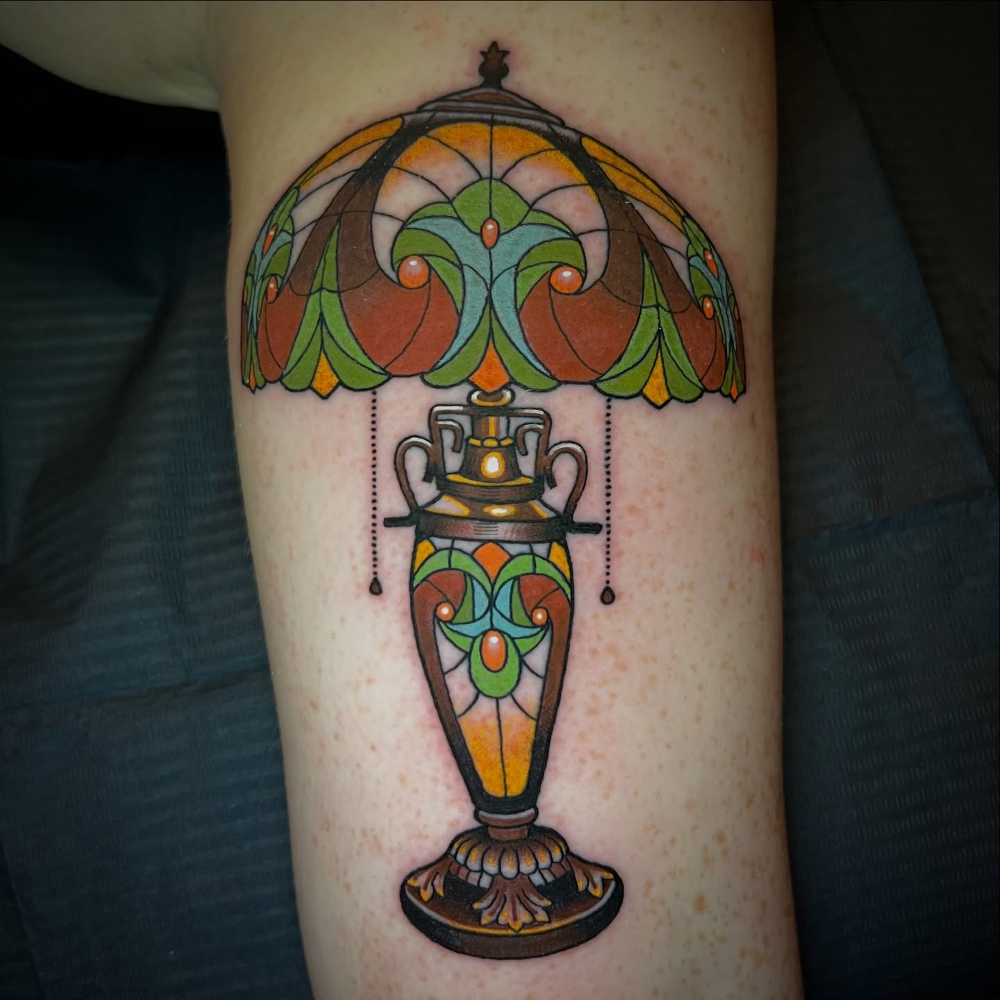 Lamp ornamental tattoo on the forearm by Michael Munter, Philadelphia, Pennsylvania