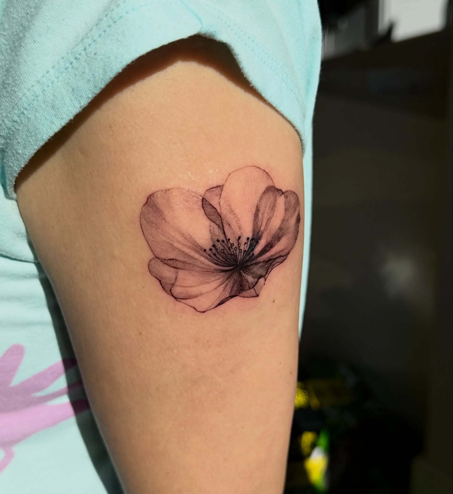 Flower black and grey tattoo on the forearm by Xin Huang