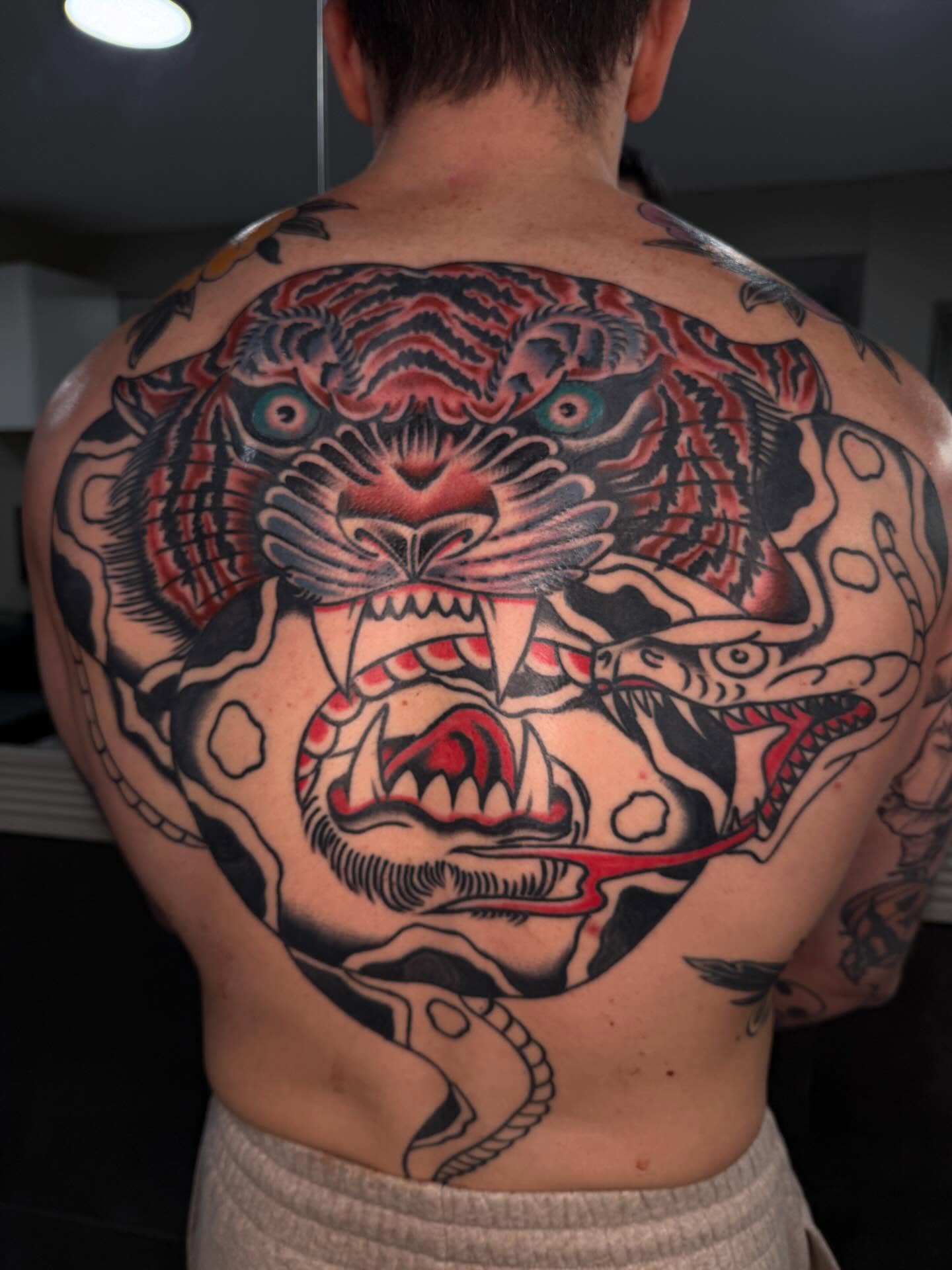 Tiger japanese irezumi tattoo on the back by Tony Kaplan