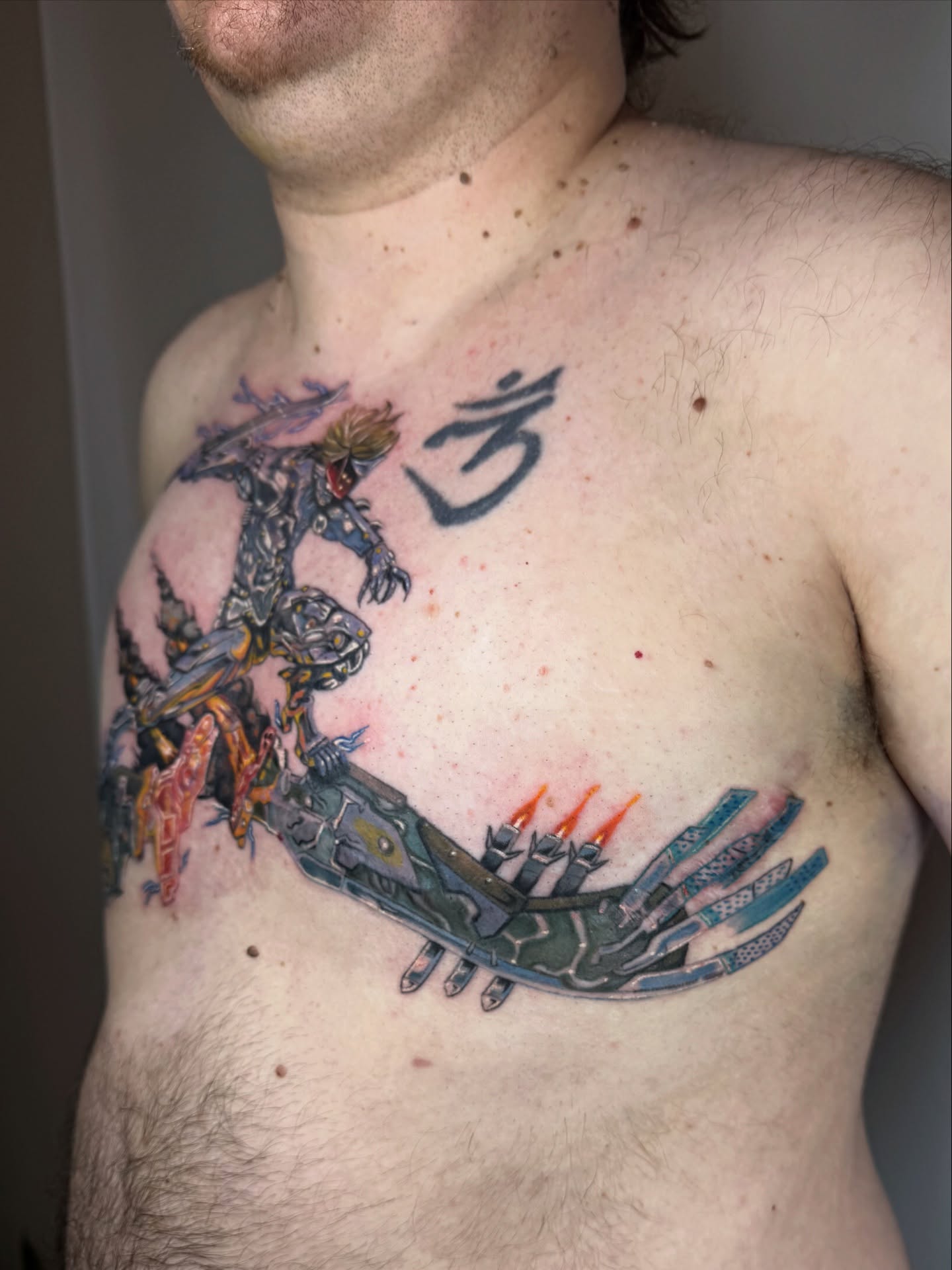 Mecha robot geometric tattoo on the chest by Franky A Bonifacio, Seattle, Washington
