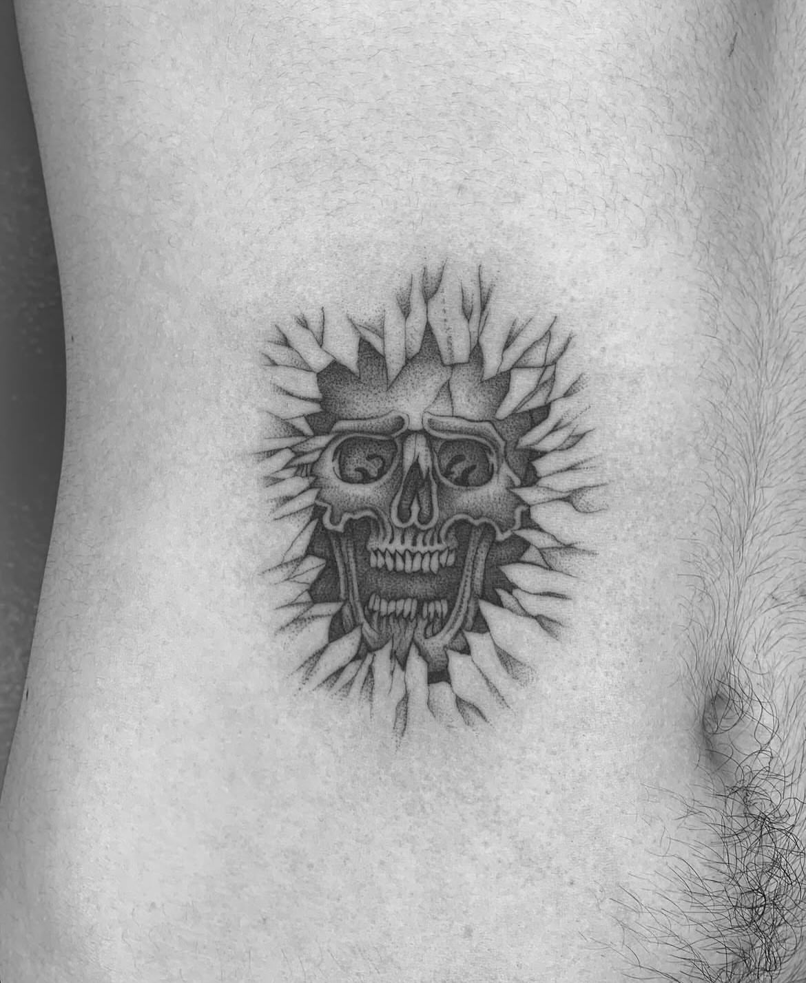 Skull dotwork tattoo on the ribs by The One Who’s Always Drawing