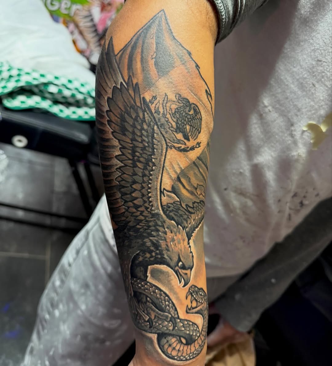 Tattoo by @barbedwireinktattoos — realism, black_and_grey