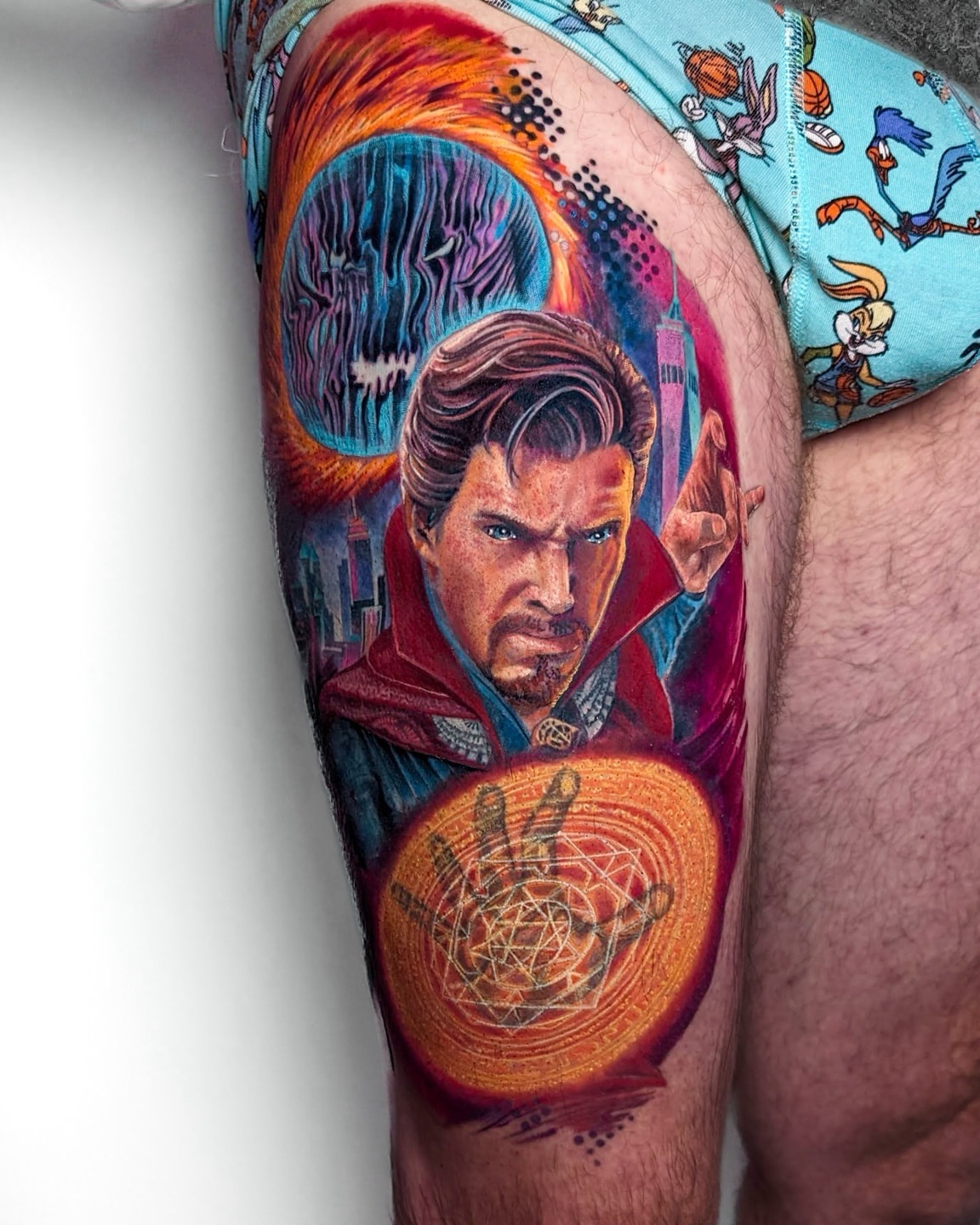 Doctor Strange realism tattoo on the thigh by Amy Zager