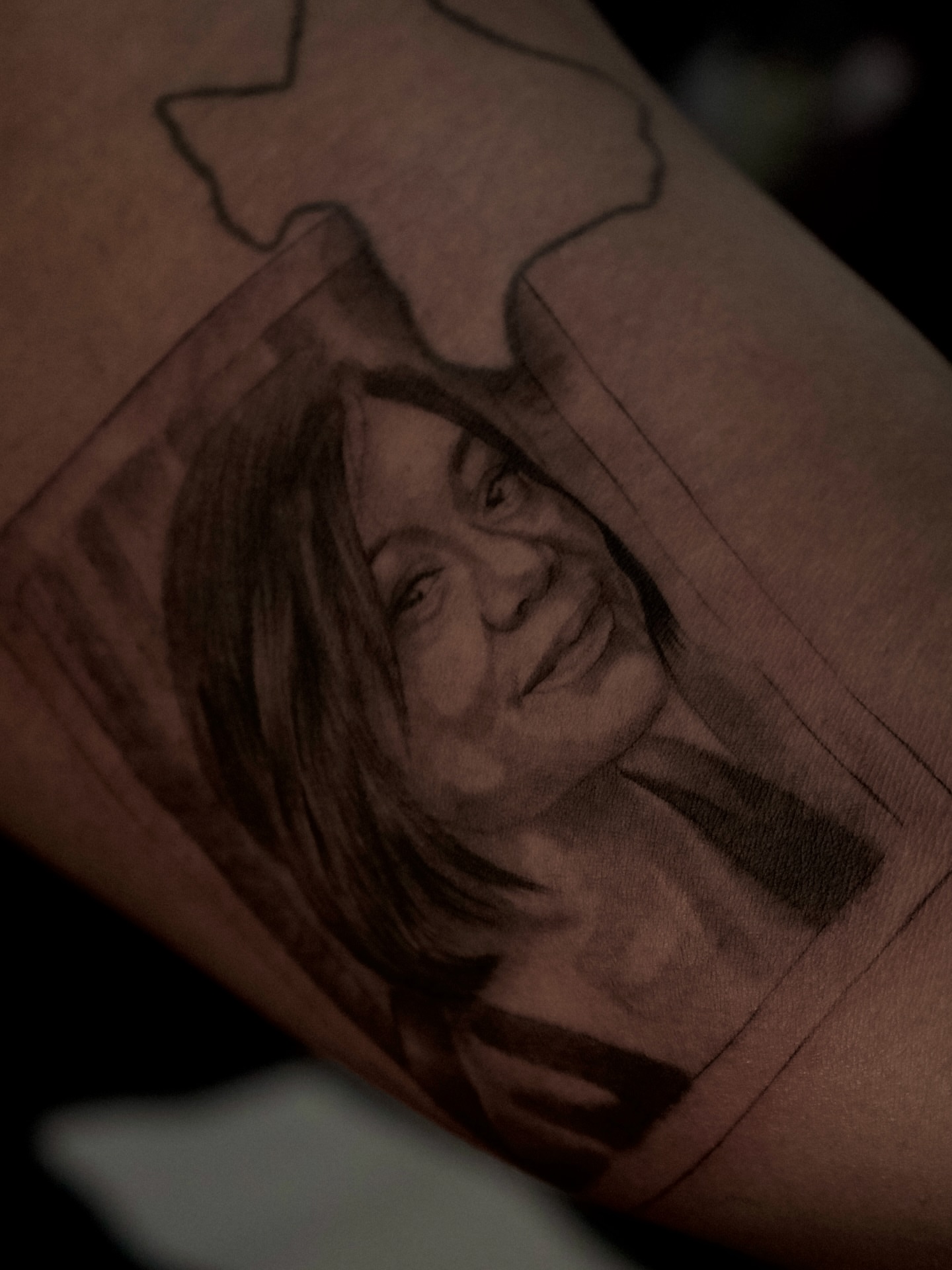 Portrait realism tattoo on the forearm by R O M y R I N C Ó N