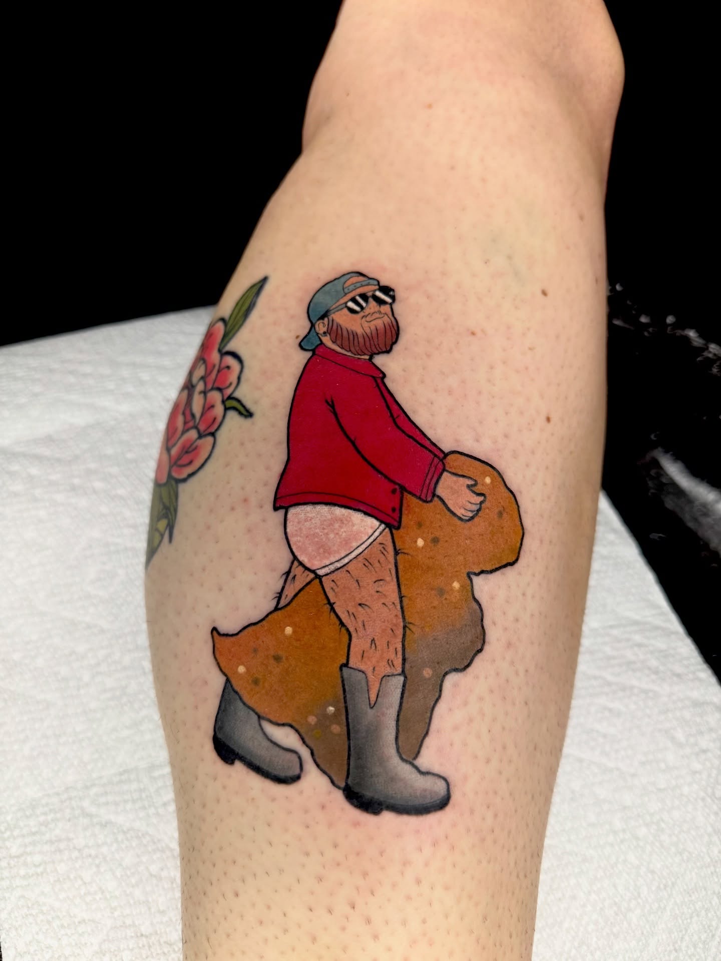 Bearded man carrying bread dotwork tattoo on the forearm by Brett Brown