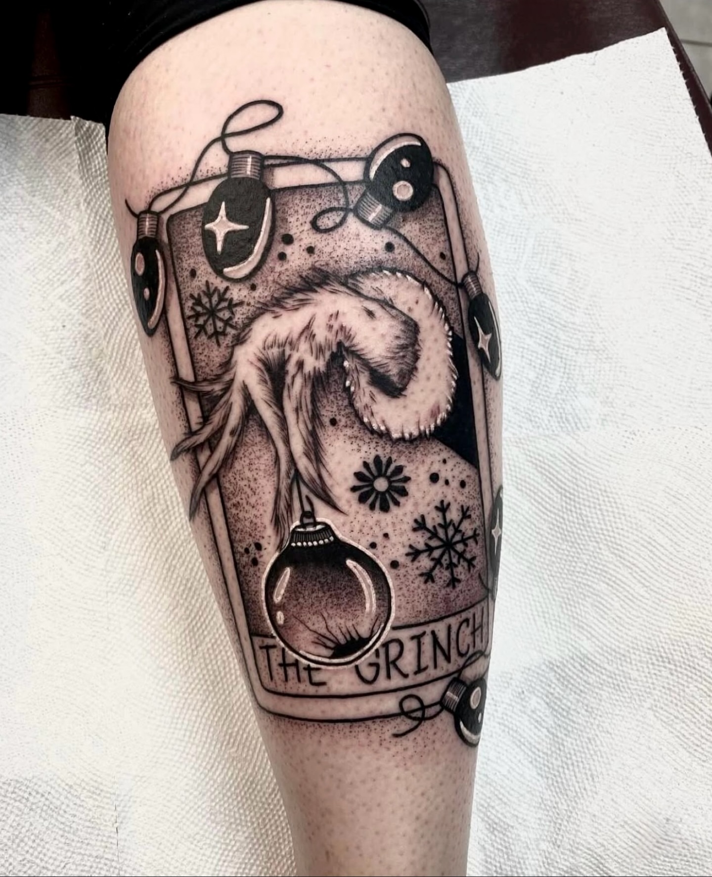 The grinch dotwork tattoo on the forearm by ⚡️ Krissy Fabis ⚡️