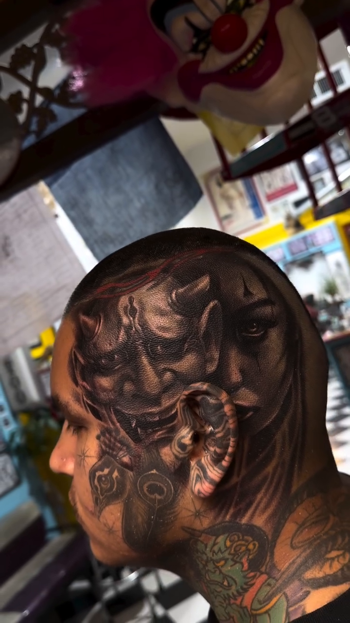 Demon face dark realism tattoo by Jason Martinez