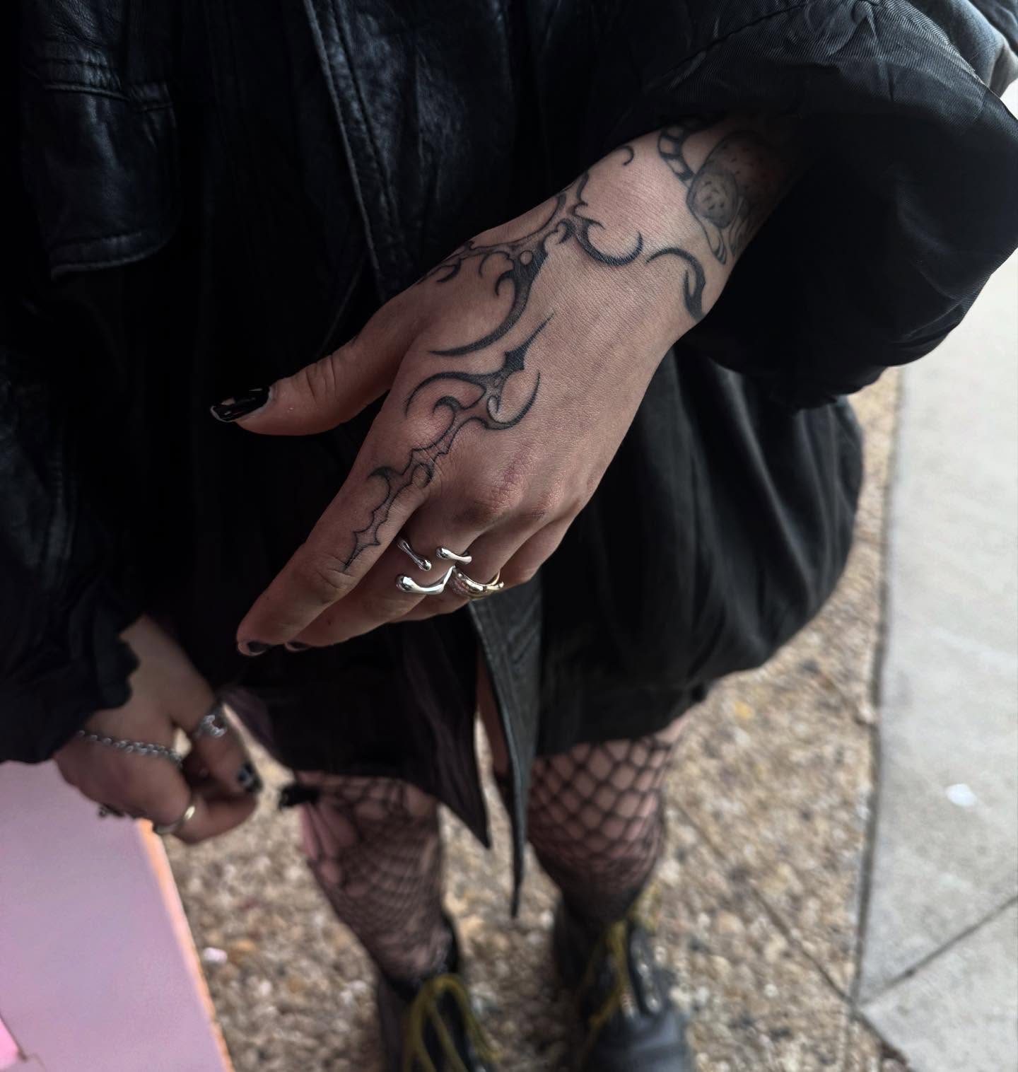 Tribal design tribal tattoo on the hand by Claire Litsey