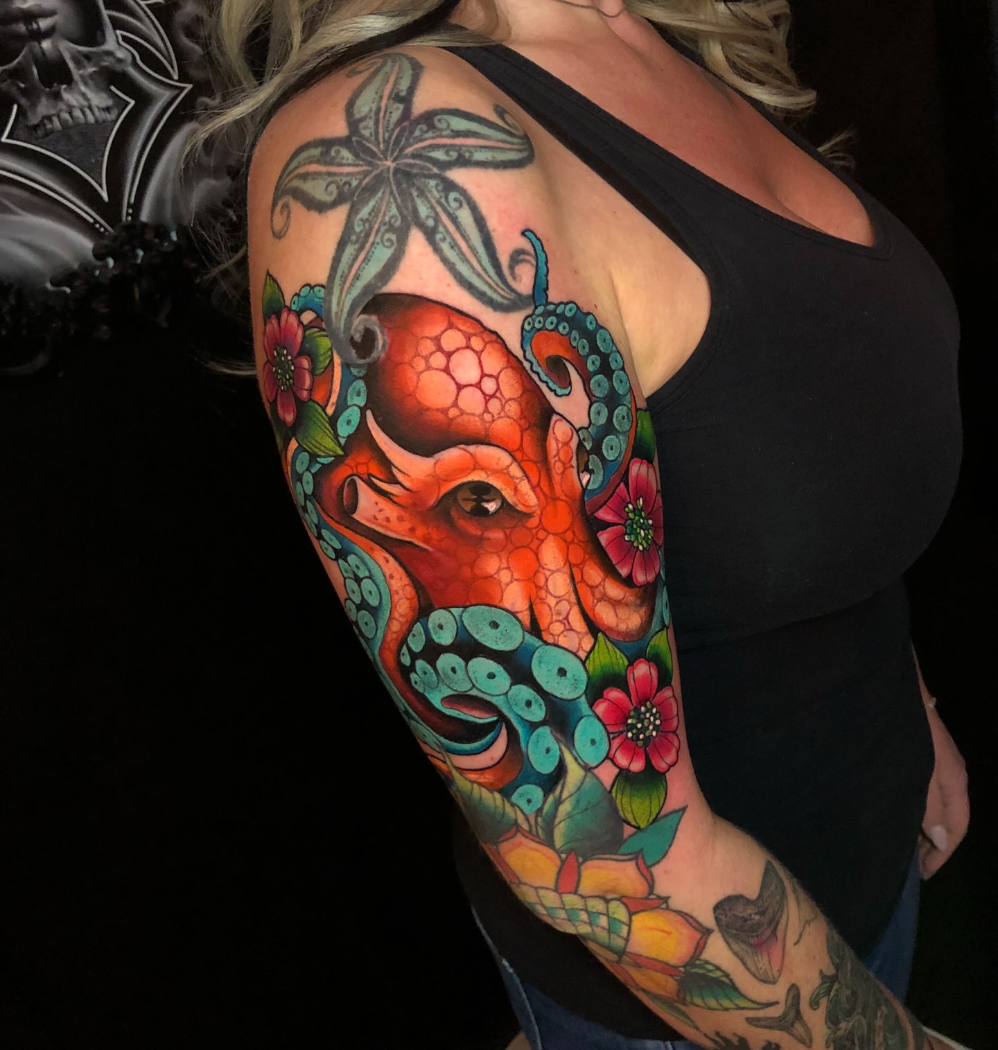 Octopus American traditional tattoo on the upper arm by Corey Ryan