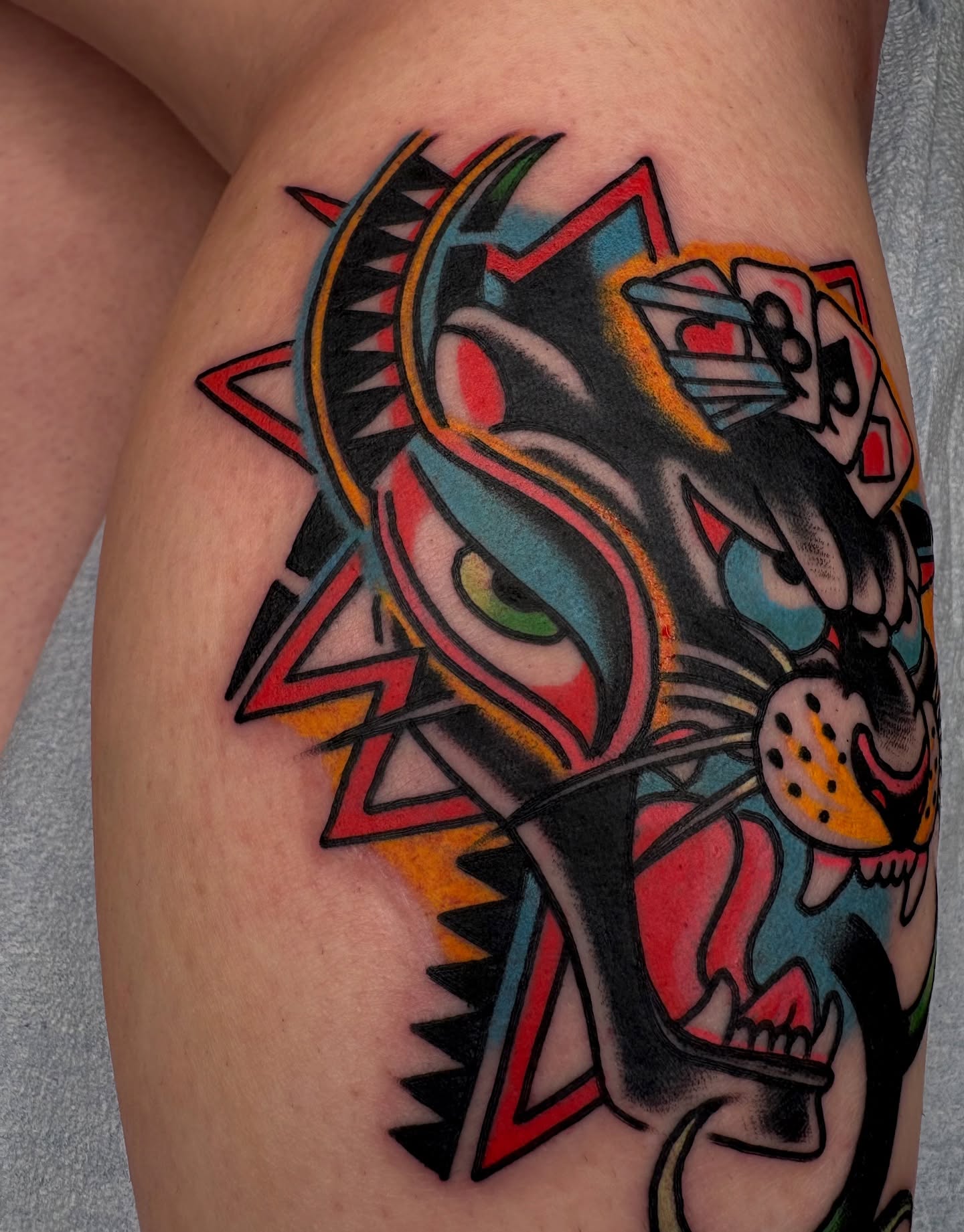 Panther American traditional tattoo on the thigh by Dallas Tattoo Artist