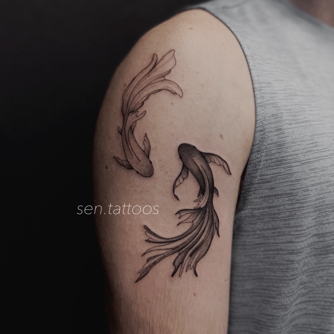 Koi fish black and grey tattoo on the shoulder by Sen Tattooer