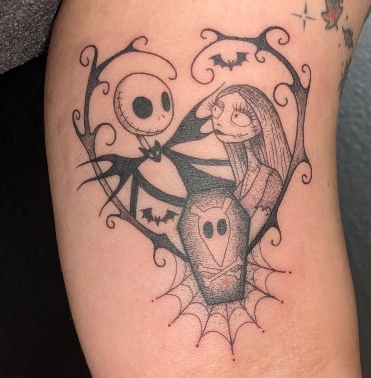Jack and Sally dark realism tattoo on the thigh by π²π°πket