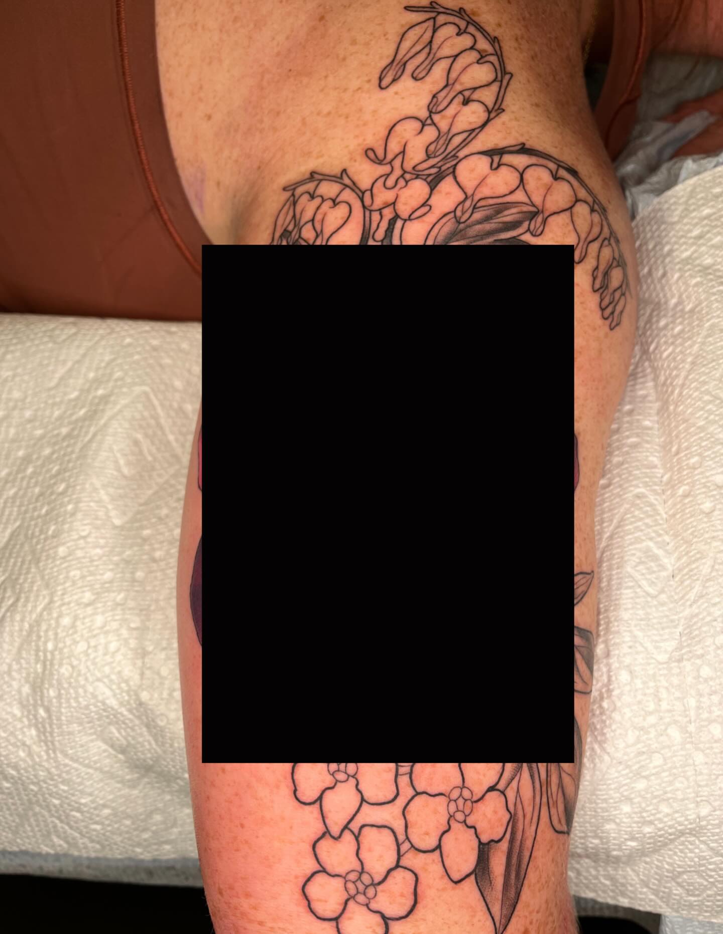 Scorpion and flowers American traditional tattoo on the thigh by Emi Collison