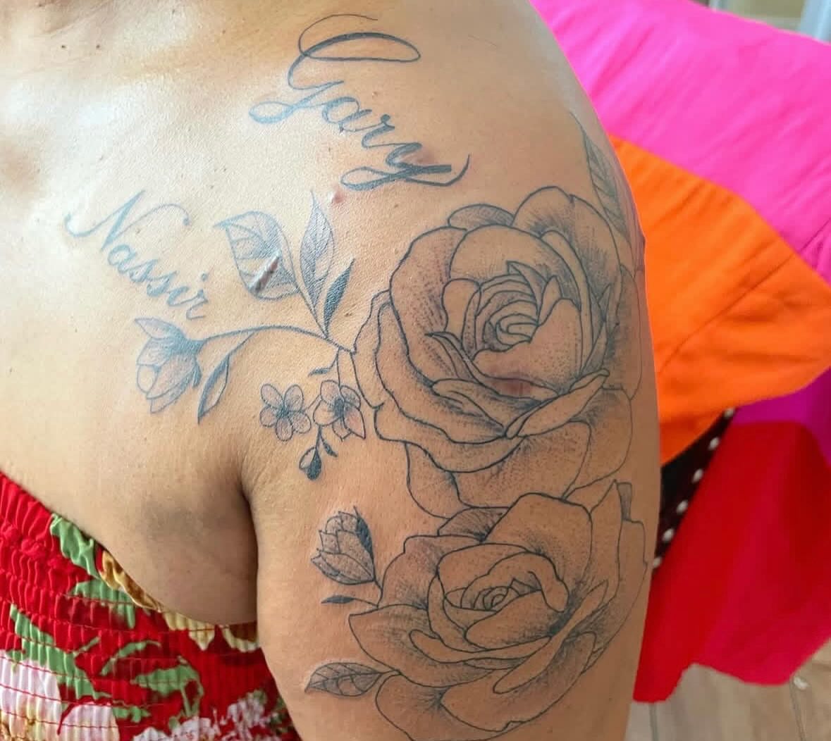 Roses and script black and grey tattoo on the shoulder by ART