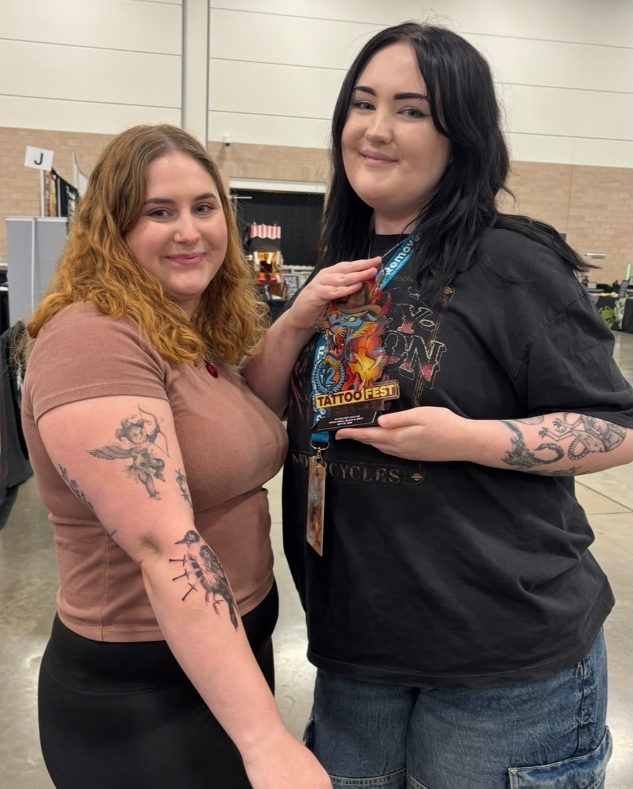 Archer American traditional tattoo on the upper arm by jordy