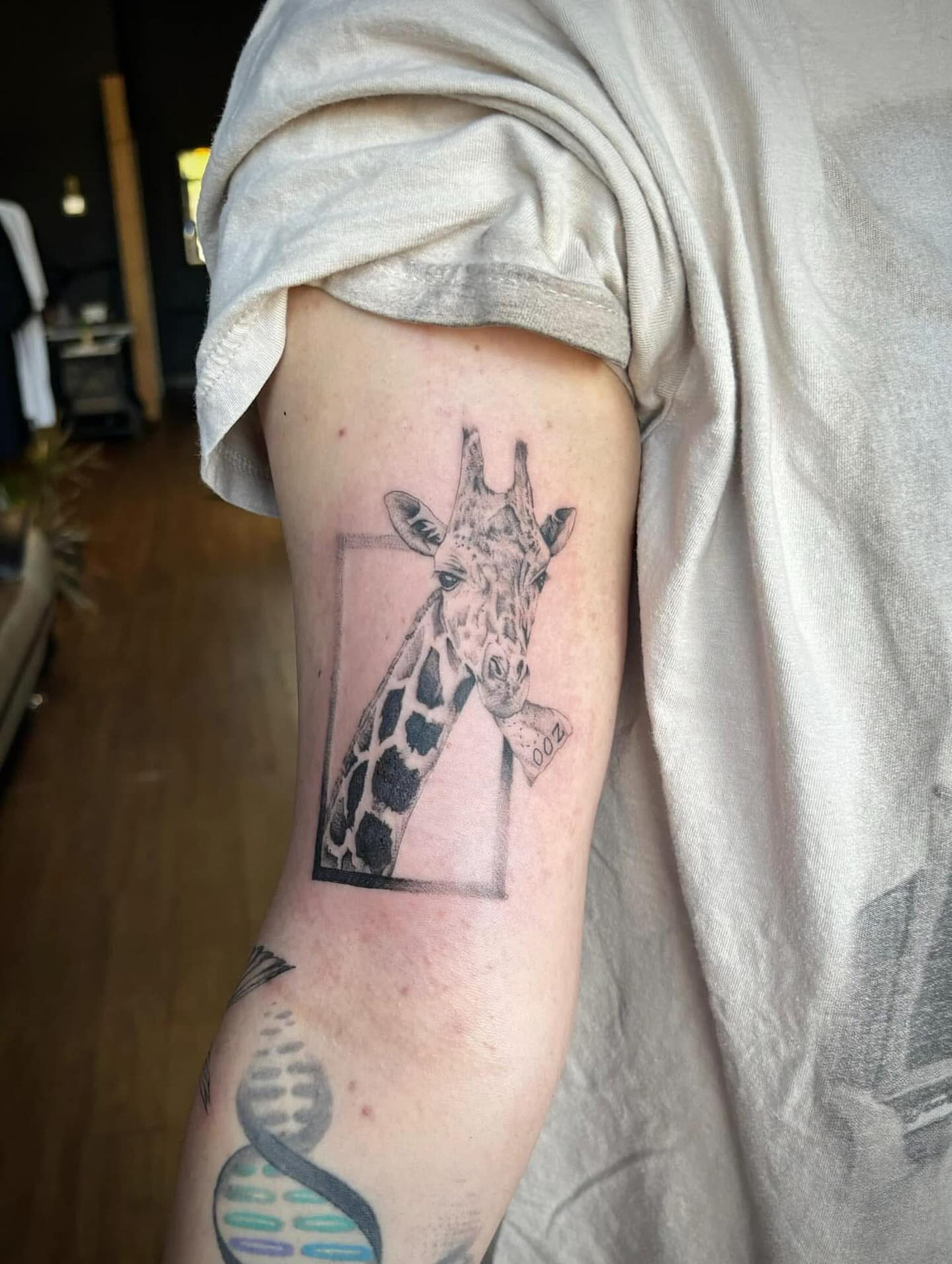 Giraffe realism tattoo on the forearm by Harley Lane ๐ซ
