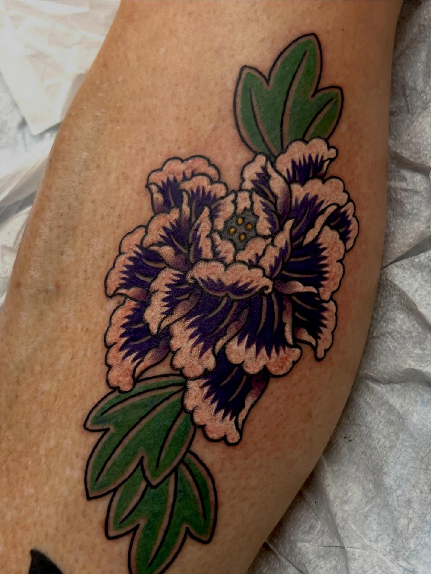 Peony American traditional tattoo on the forearm by Rocky Burley, Georgetown, Texas