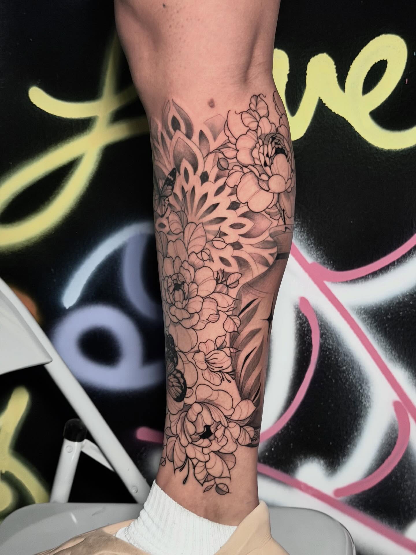 Floral bouquet black and grey tattoo on the forearm by Kbtattz
