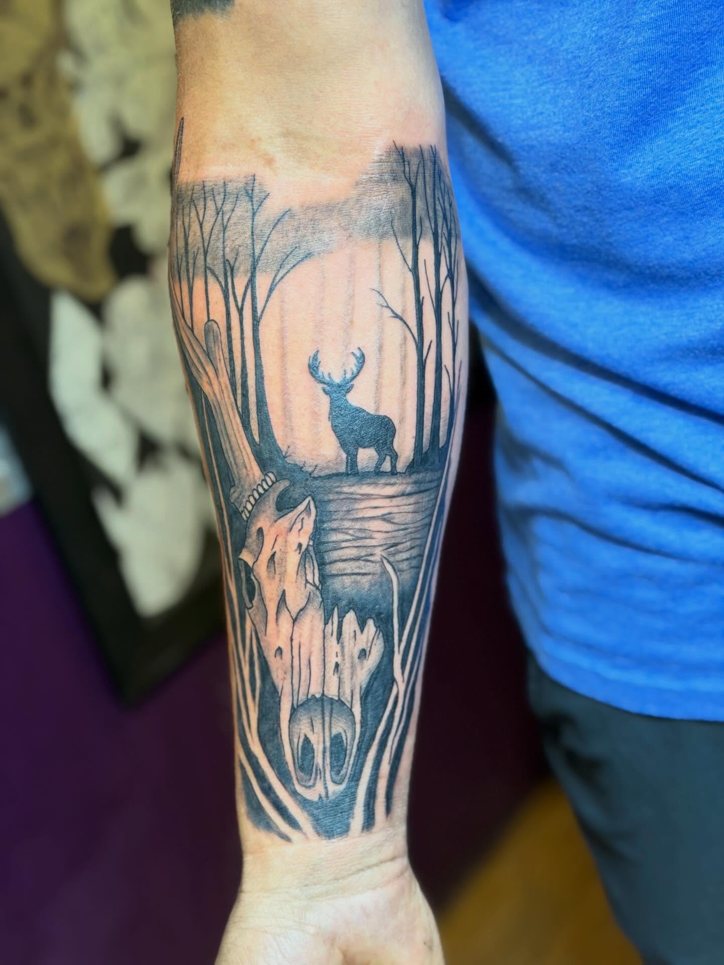 Deer in forest realism tattoo on the forearm by Joshua Ware, Alvarado, Texas