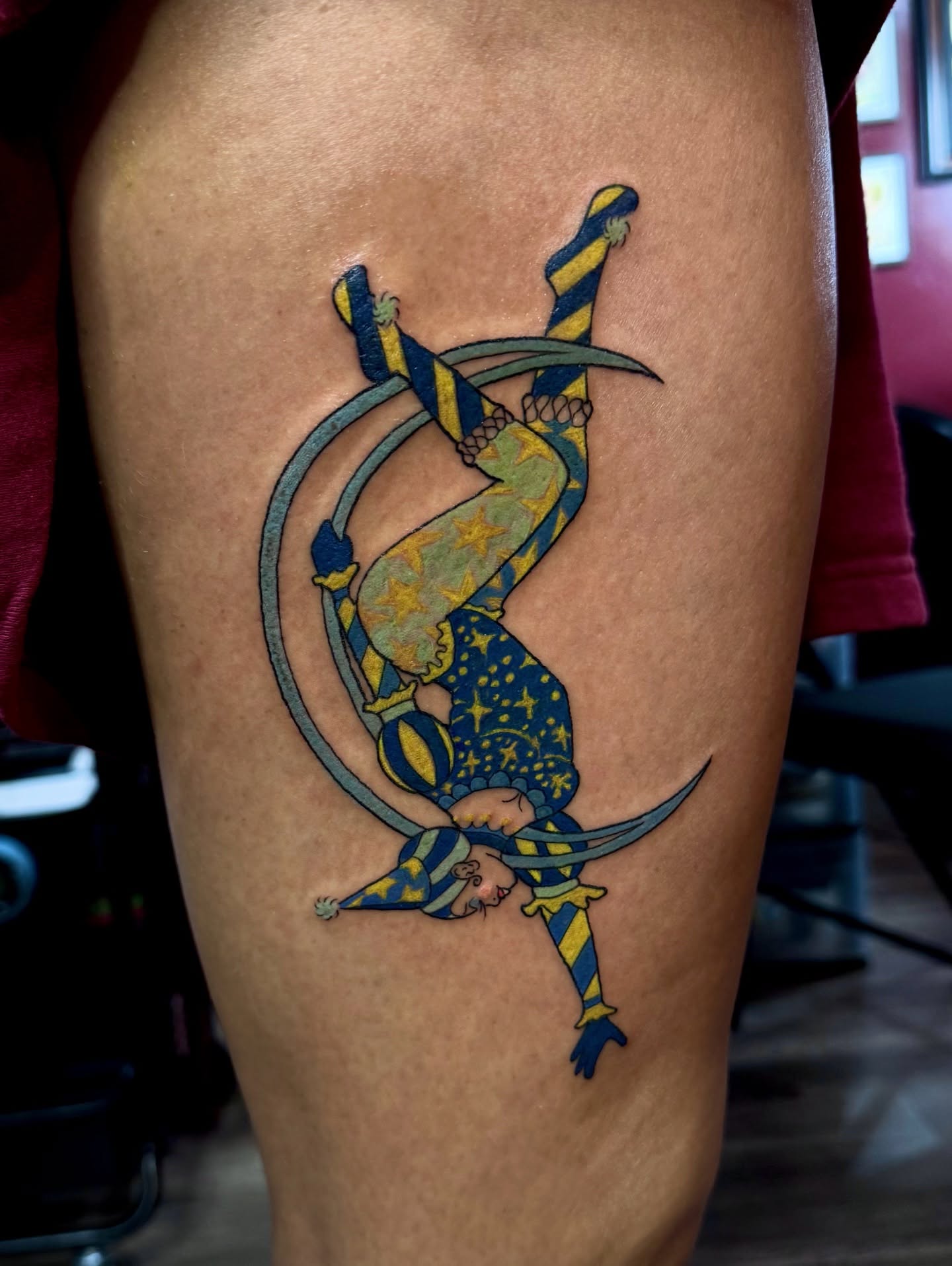Acrobatic figure new school tattoo on the thigh by Stevie Reign