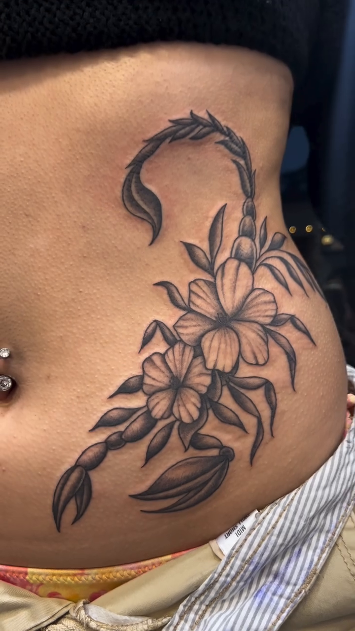 Scorpion and flowers realism tattoo by Ana Valadez π¦, Ventura, California