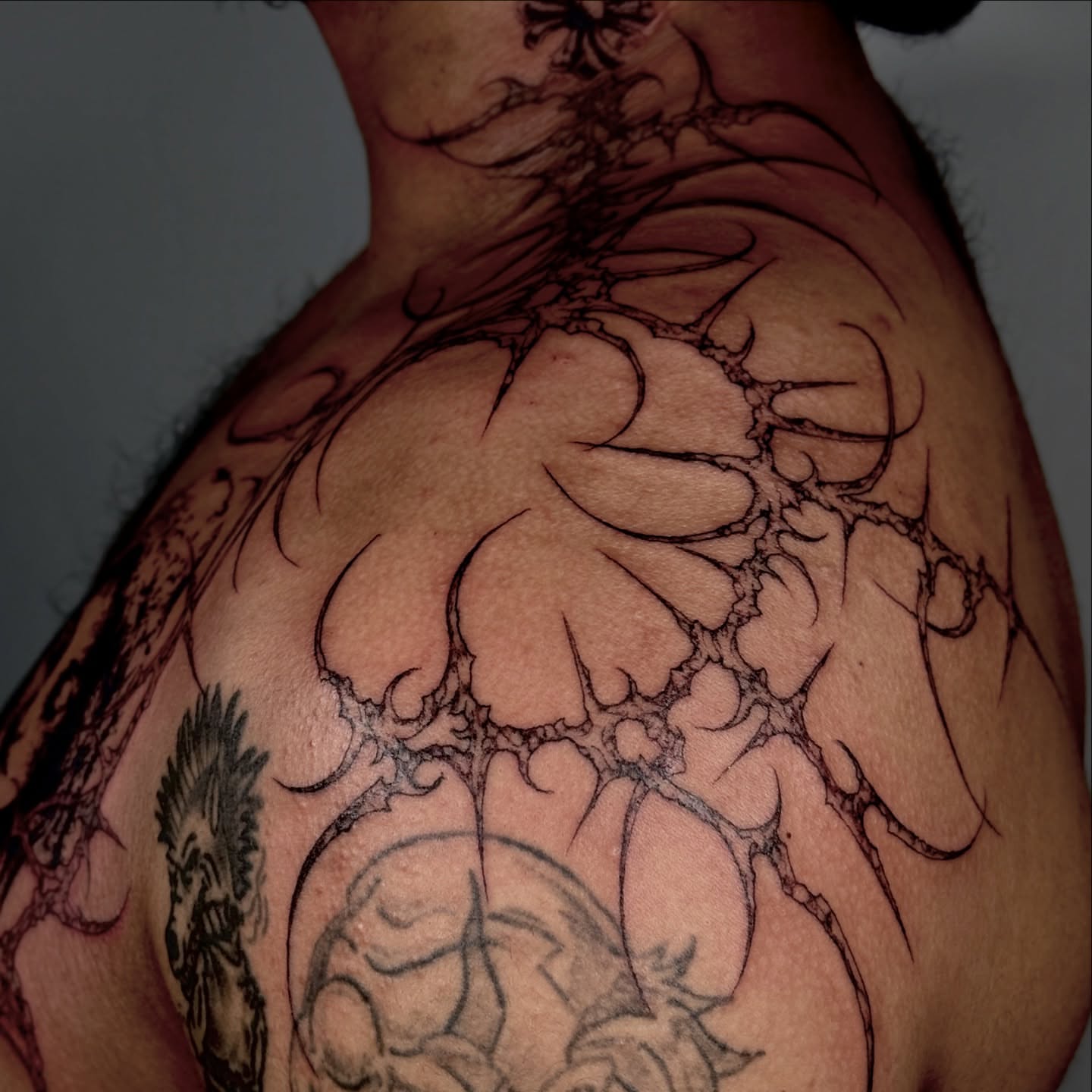 Tattoo by @grimsaintt — black_and_grey