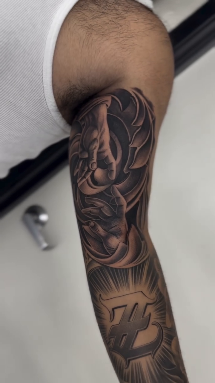 Dragon and sun realism tattoo by Kyle Lopez, Union City, California