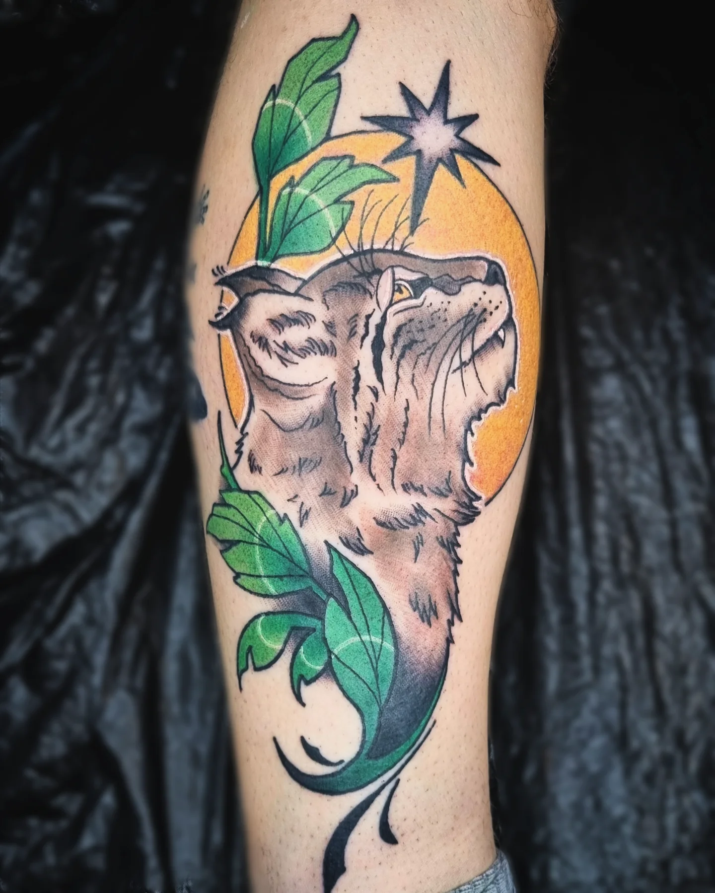 Cat and moon American traditional tattoo on the forearm by AntiheroTattoo