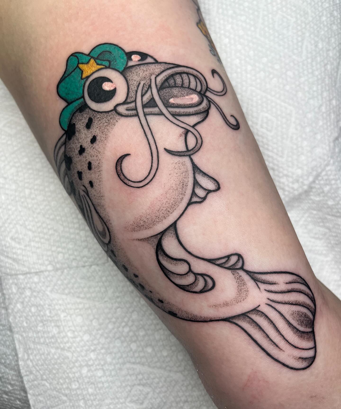 Puffer fish dotwork tattoo on the forearm by Abby Brooks, Memphis, Tennessee