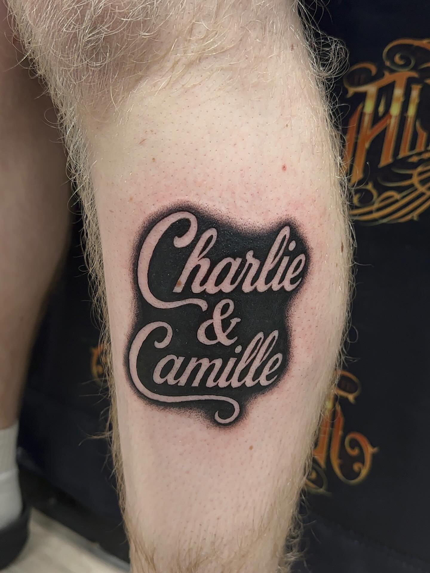 Charlie & Camille lettering script tattoo on the forearm by Cherry Tats🍒