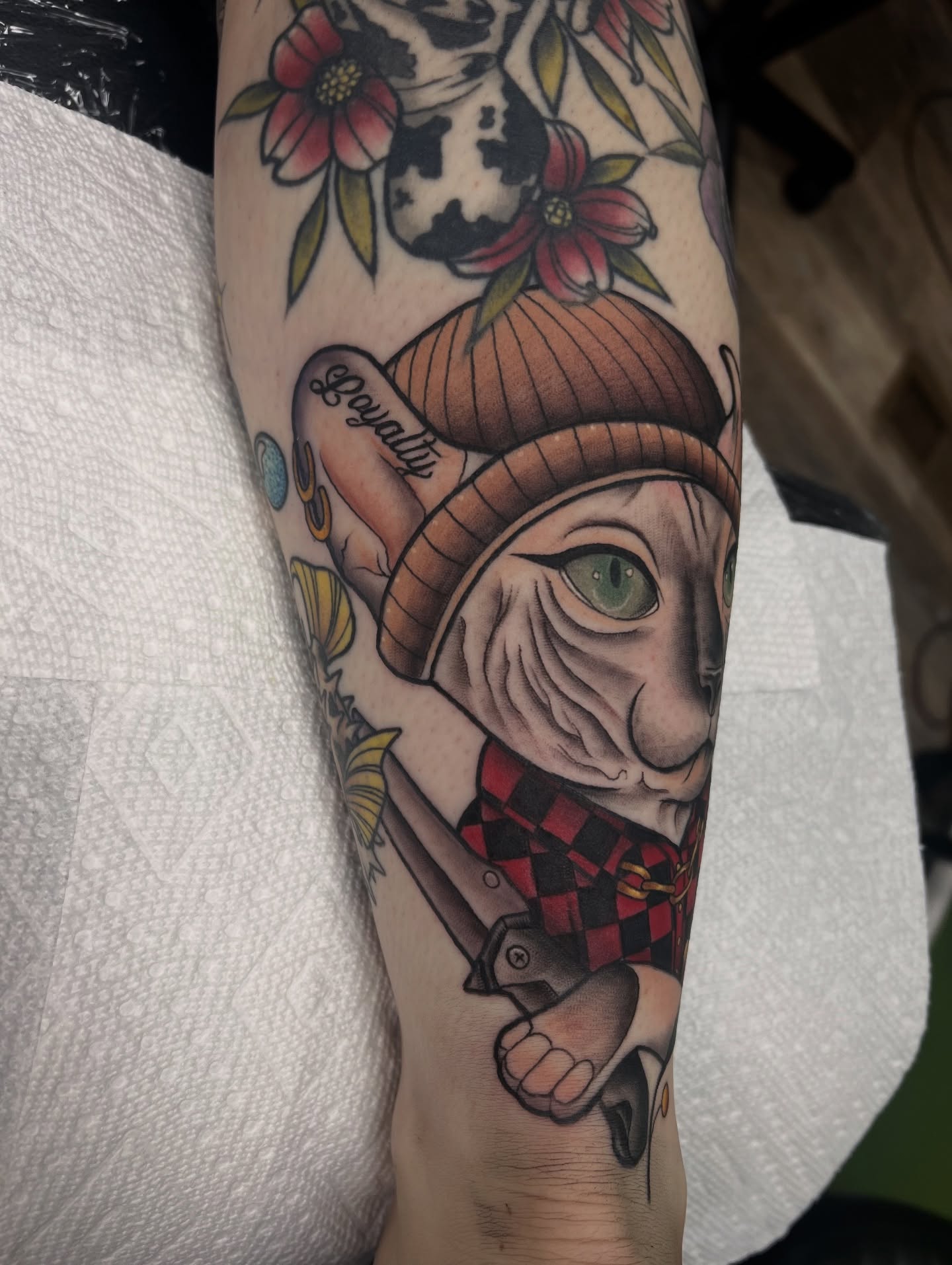 Cat with hat American traditional tattoo on the forearm by Olivia Suzanne Fada