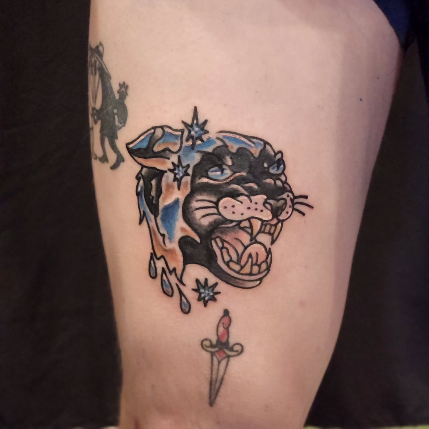 Panther head American traditional tattoo on the thigh by Sonya ๐ฟ๐ธ๐พ