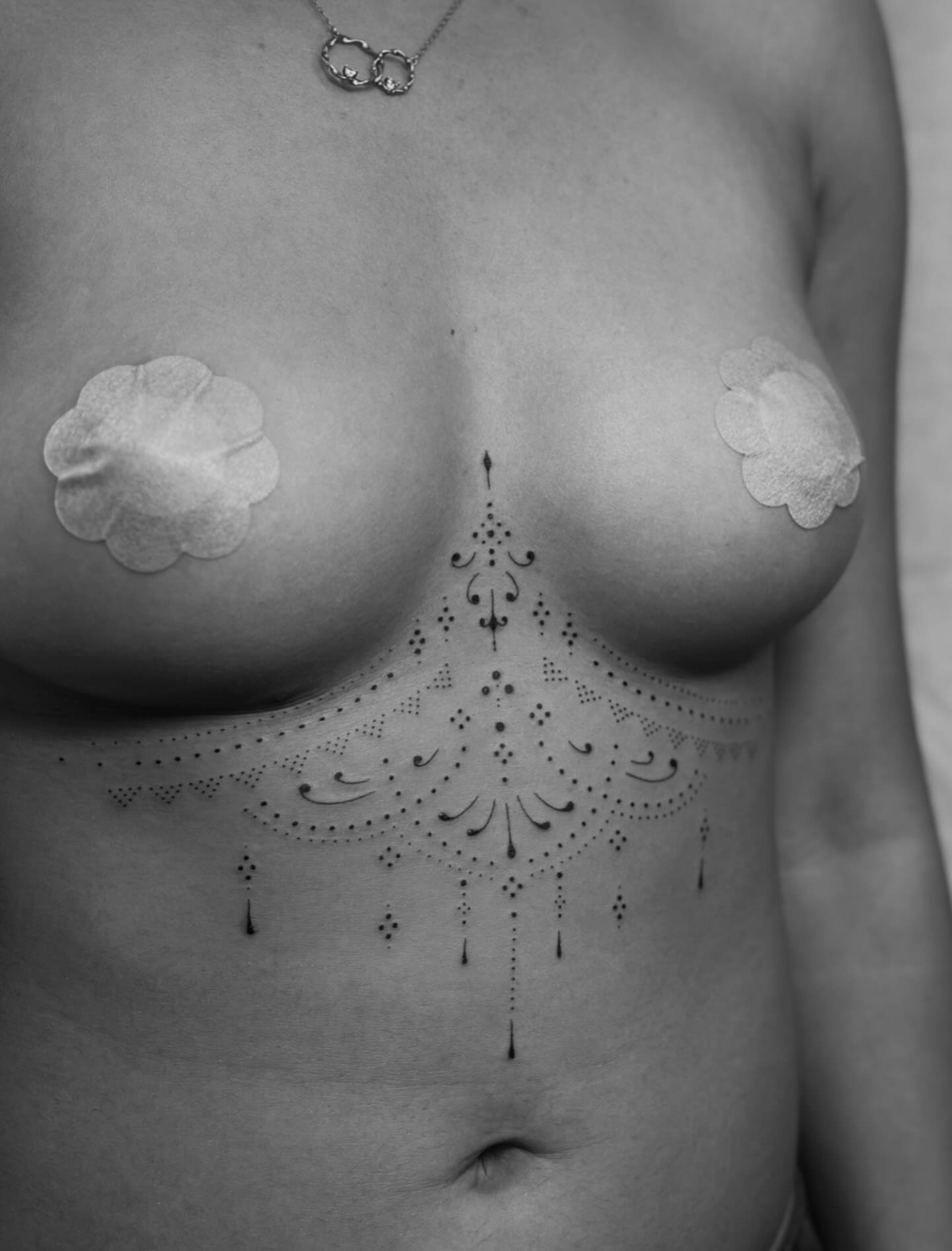 Geometric mandala dotwork tattoo on the chest by ꕥ LANA MOON TATU ꕥ