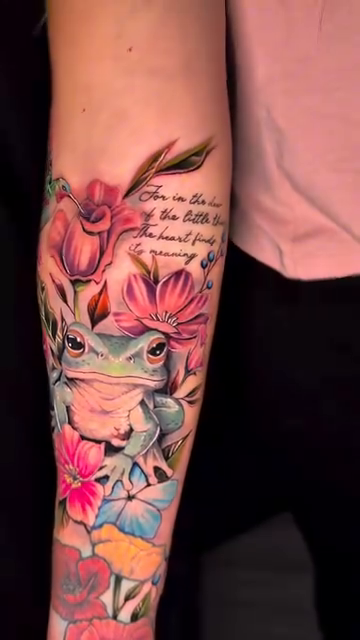 Frog with flowers realism tattoo by Travis Sleeper