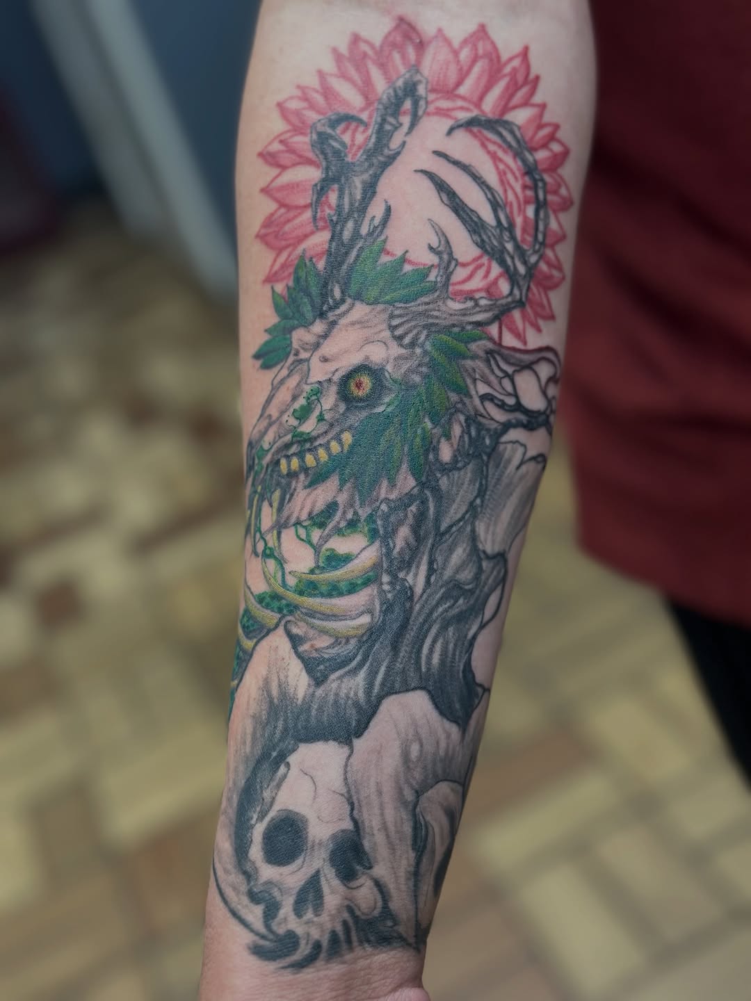 Skull with antlers and ribs dark art tattoo on the forearm by vannadoestattoos